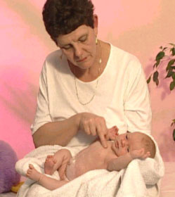 picture of Maria Mercati performing baby tui na massage on a baby